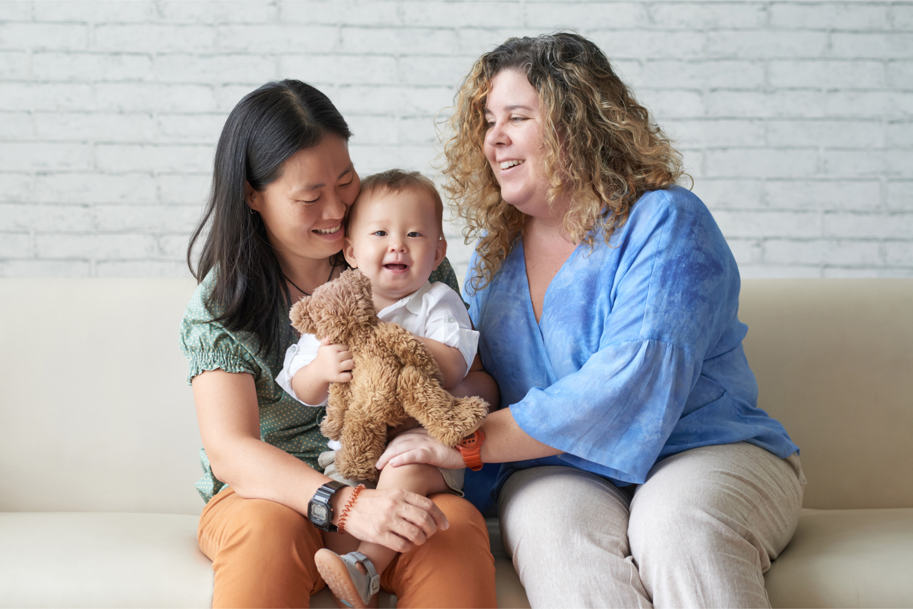 diverse-lesbian-couple-sitting-with-child-2021-09-03-17-21-36-utc_1.jpg