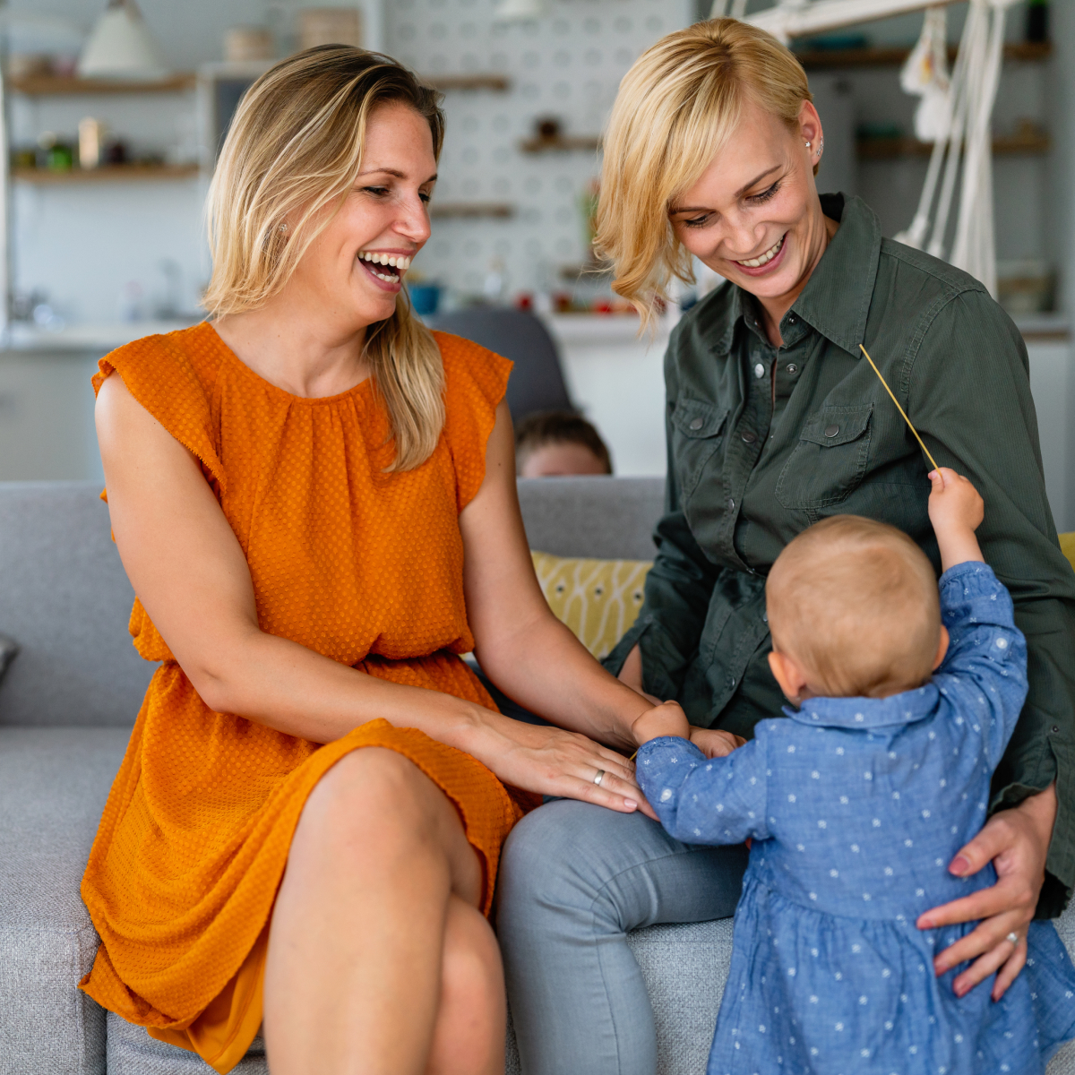 happy-lesbian-female-couple-with-her-little-child-2022-02-01-22-36-25-utc_1.jpg