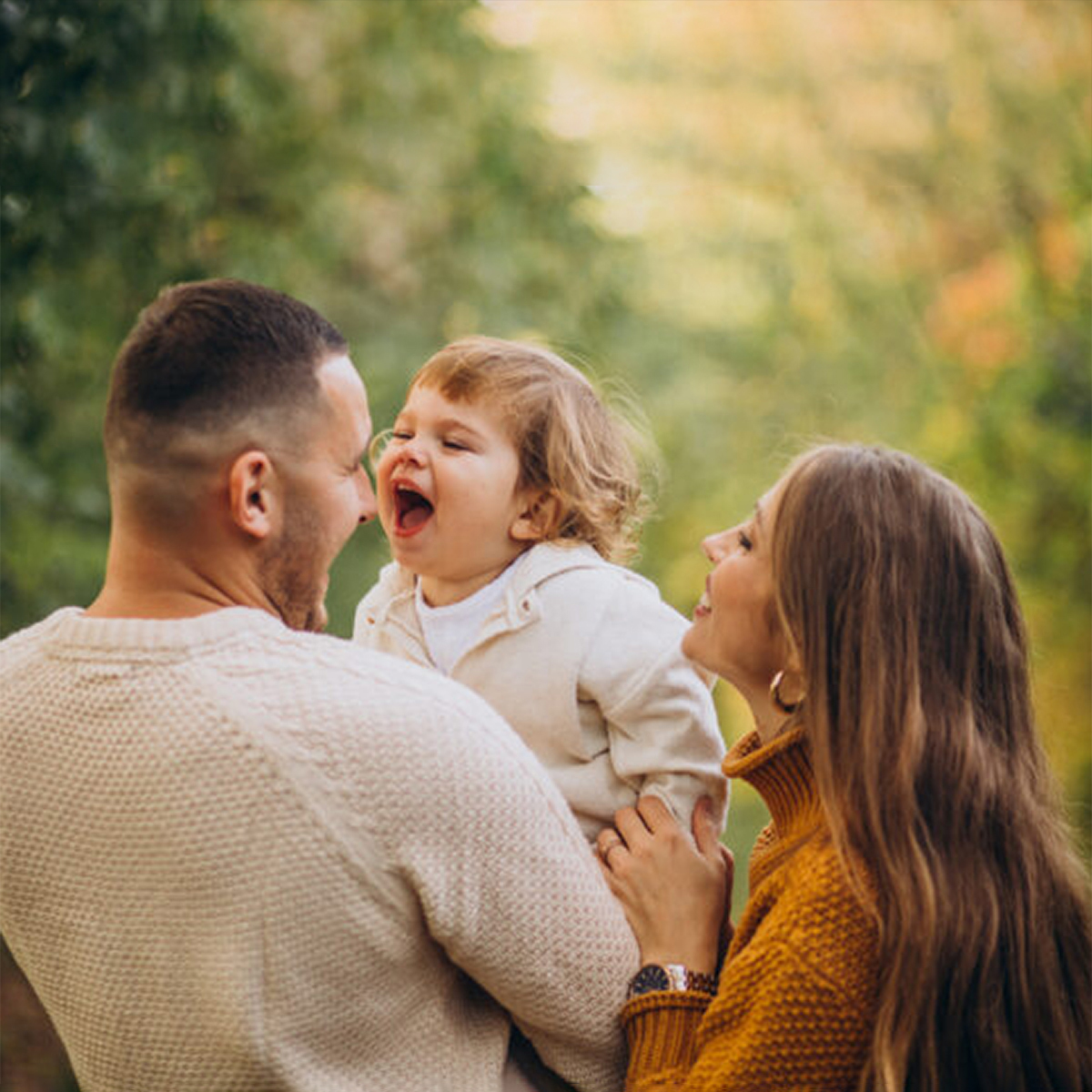 young-family-with-children-autumn-park-1200-v2.jpg